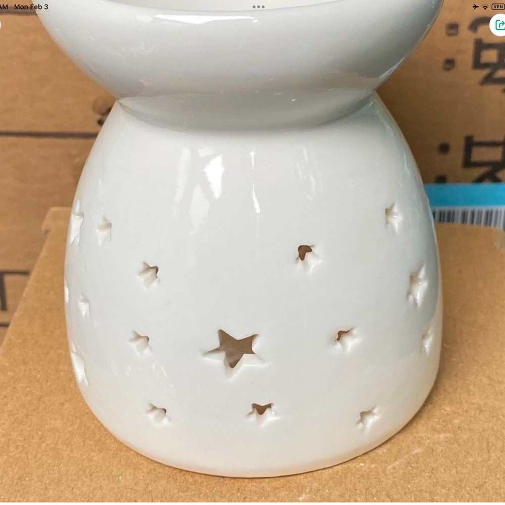 Adorable star tea light new in box